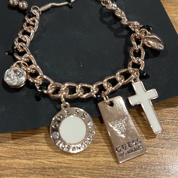 Guess gold plated bracelet with charms - Picture 3 of 3